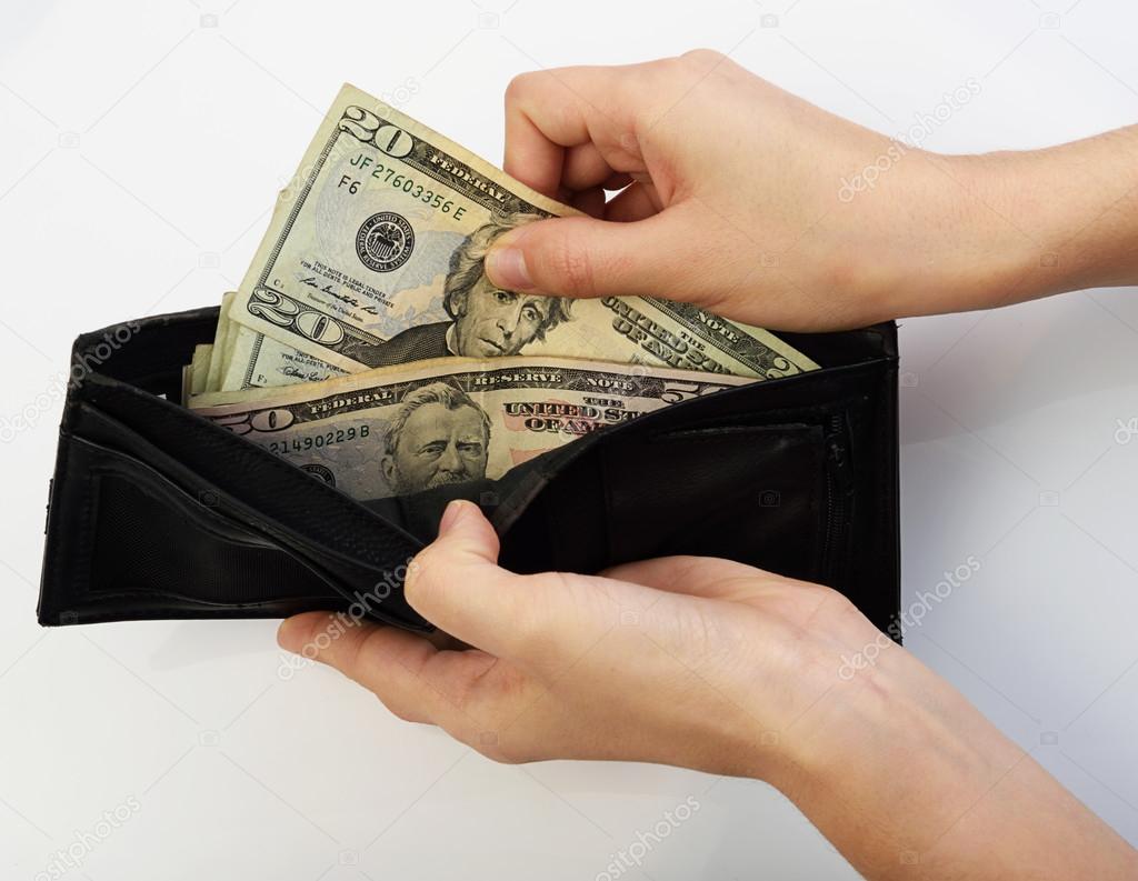 Person taking money from wallet