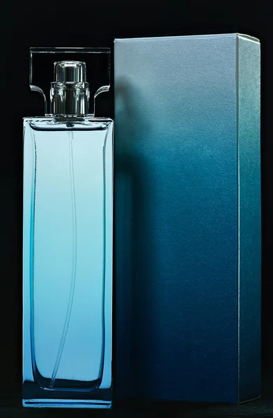 Cząsteczki niebieska butelka i pole — Zdjęcie stockowe