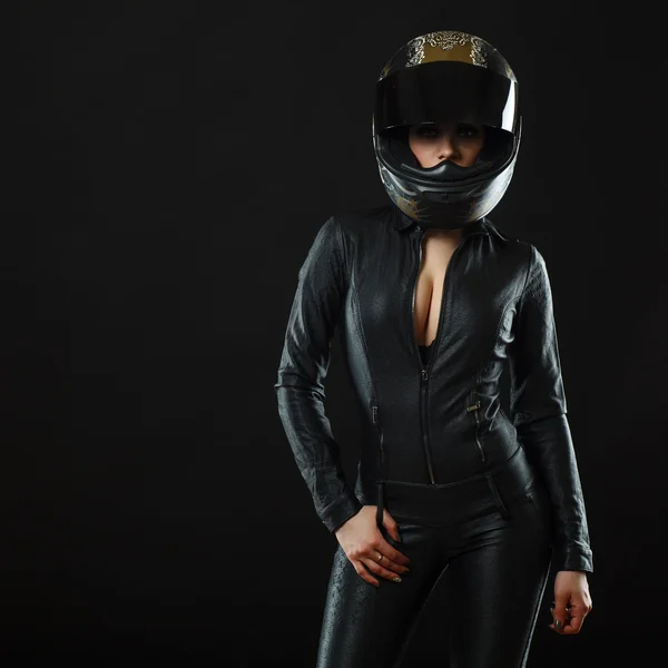 Biker girl posing in studio — Stock Photo, Image