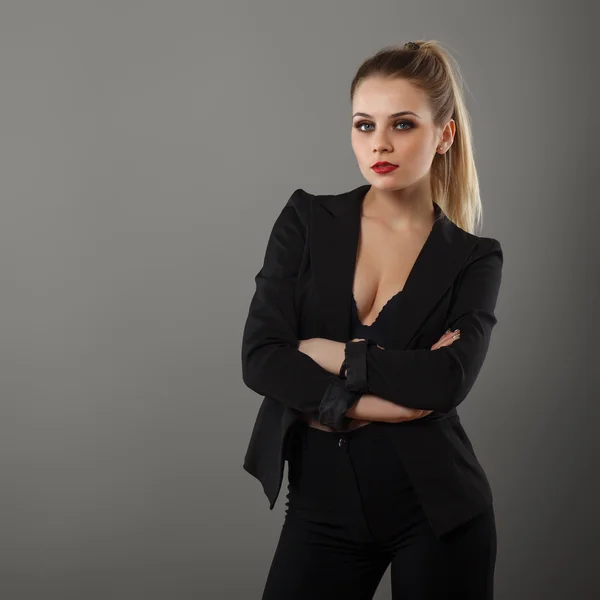 Business girl posing in the studio — Stock Photo, Image