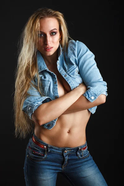 Beautiful woman body in jeans — Stock Photo, Image