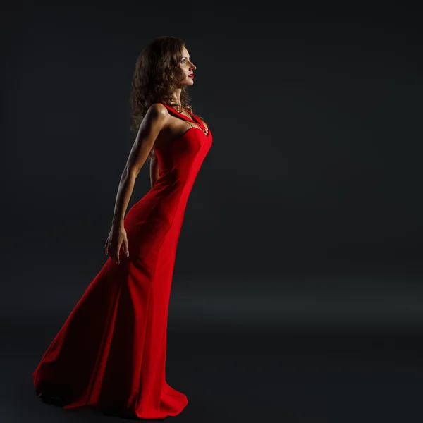 Retrato de bela mulher sensual na moda vestido vermelho . Fotografias De Stock Royalty-Free