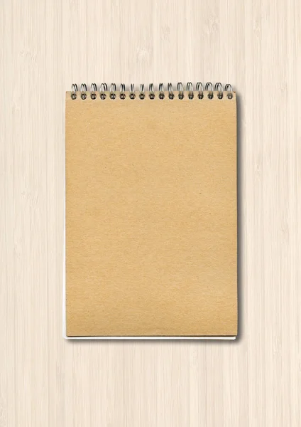 Spiral Closed Notebook Mockup Brown Paper Cover Isolated White Wood — Stock Photo, Image