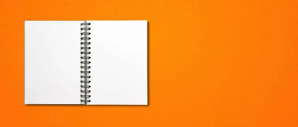 橙色横幅上孤立的空白螺旋式笔记本电脑模型 — 图库照片