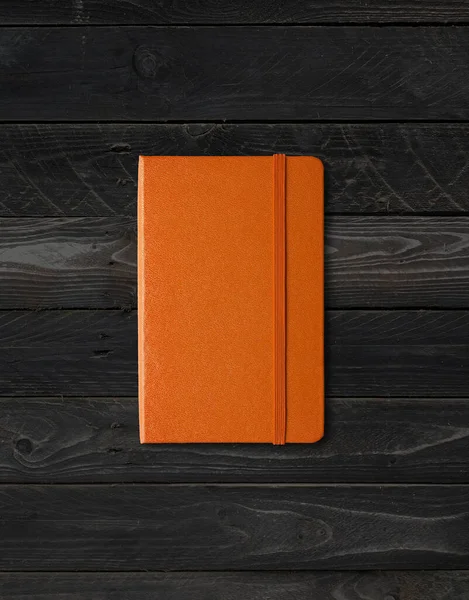 Cuaderno Naranja Cerrado Mockup Aislado Sobre Fondo Madera Negra —  Fotos de Stock