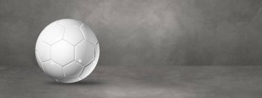 Beton bir stüdyo pankartıyla izole edilmiş beyaz futbol topu. 3B illüstrasyon