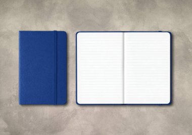 Marine blue closed and open lined notebooks mockup isolated on concrete background clipart
