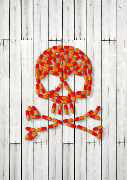 Skull Made Orange Capsule Pills Isolated White Wooden Background Illustration — Stock Photo, Image