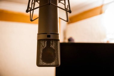 Paris - France -December 1, 2020 : Neumann microphone in a professional audio studio clipart