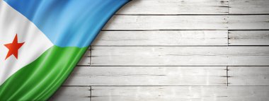 Cibuti bayrağı eski beyaz duvarda. Yatay panoramik pankart.