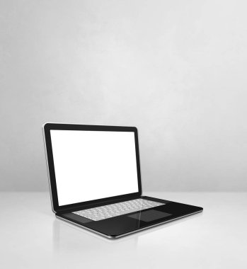 Beyaz beton ofis arka planında dizüstü bilgisayar. 3B Görüntü