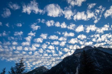 Altocumulus clouds on Vanoise national Park mountains, Savoy, French alps clipart