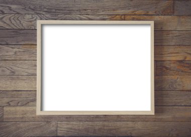 Ahşap çerçeve eski ahşap duvarda asılı.