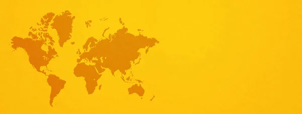 World map isolated on yellow wall background. Horizontal banner