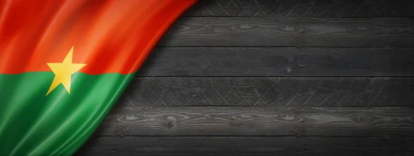 布基纳法索国旗挂在黑木墙上 水平全景横幅 — 图库照片