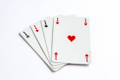 Čtyři esa hraní karetní hry izolované na bílém pozadí.