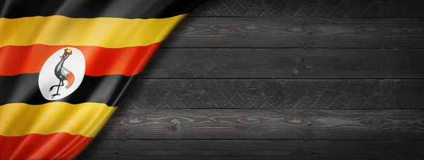 Oegandese Vlag Zwarte Houten Muur Horizontale Panoramische Banner — Stockfoto