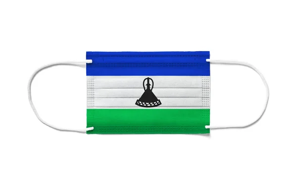 Ameliyat Maskesinde Lesotho Bayrağı Beyaz Arkaplan Izole — Stok fotoğraf