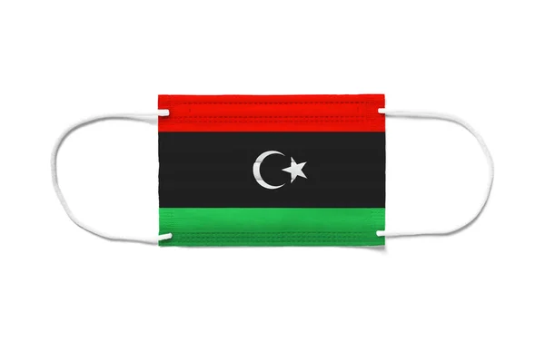 Tek Kullanımlık Ameliyat Maskesinde Libya Bayrağı Beyaz Arkaplan Izole — Stok fotoğraf