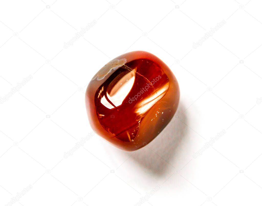 Carnelian agate gemstone isolated on a white background