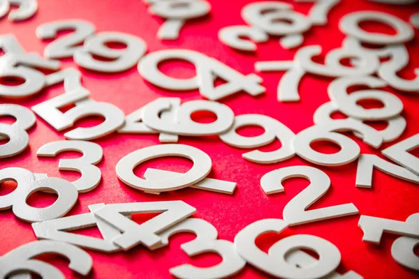 Wiskunde Achtergrond Gemaakt Met Solide Getallen Een Bord Geïsoleerd Rood — Stockfoto