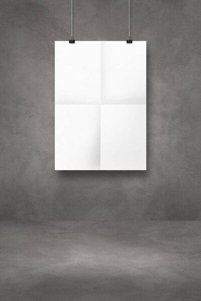 White folded poster hanging on a dark concrete wall with clips. Blank mockup template