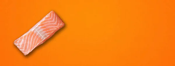 Salmon Steak Isolated Orange Background Top View Horizontal Banner — Stock Photo, Image