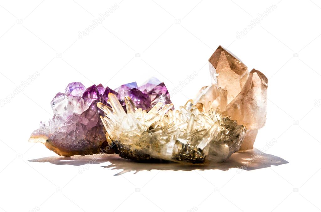 Amethyst and quartz gemstones isolated on a white background