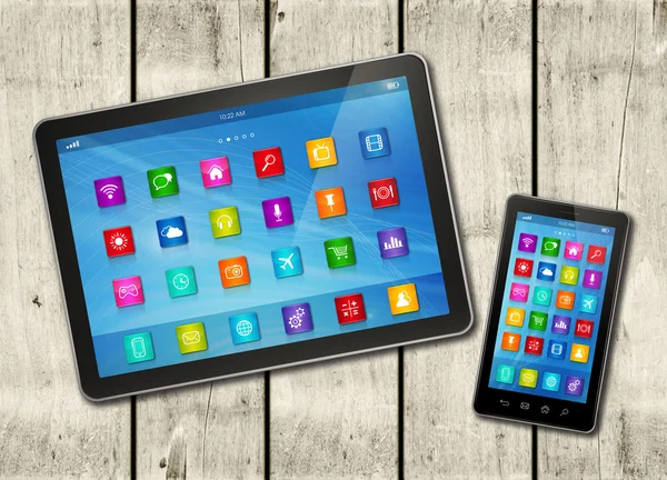 Smartphone y tableta digital PC con iconos de escritorio en una w blanca — Foto de Stock
