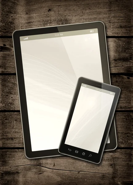 Smartphone and digital tablet PC on a dark wood table — Stock Photo, Image