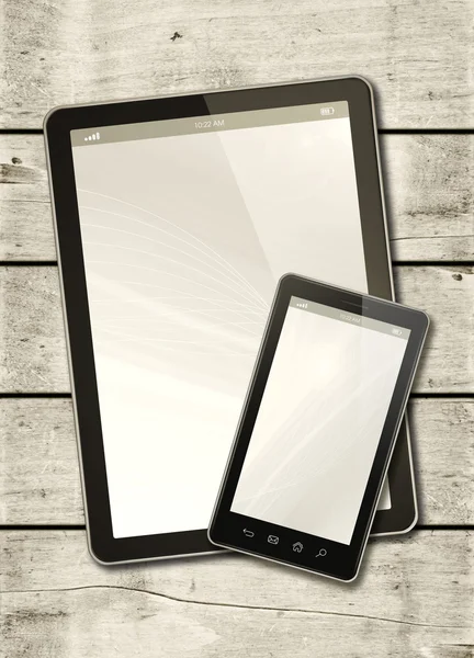Smartphone und digitaler Tablet-PC auf einem weißen Holztisch — Stockfoto