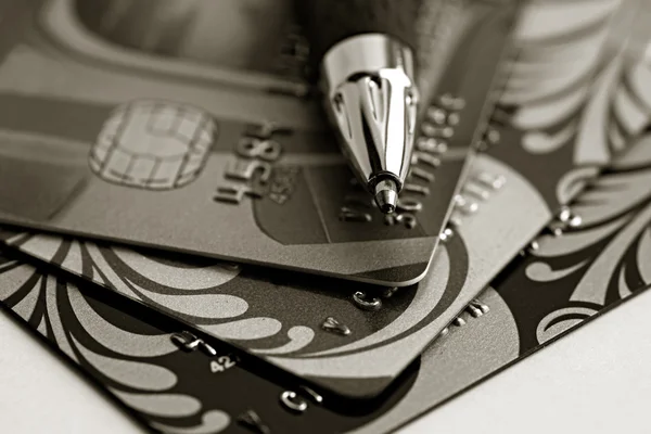 Close up a credit card and pen — Stock Photo, Image