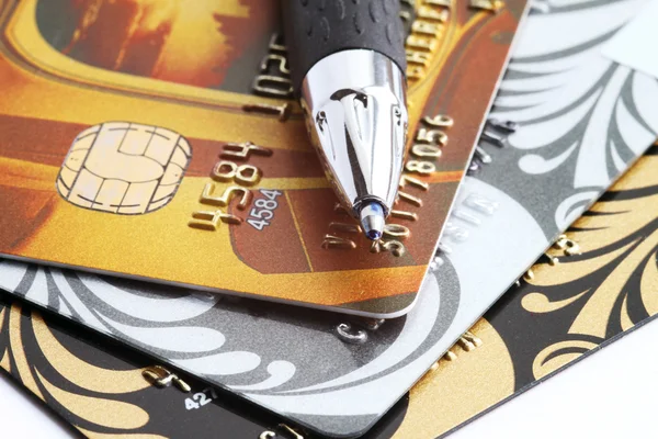 Close up a credit card and pen — Stock Photo, Image