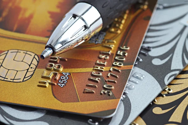 Close up a credit card and pen — Stock Photo, Image