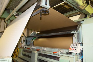 Factory to produce corrugated cardboard clipart