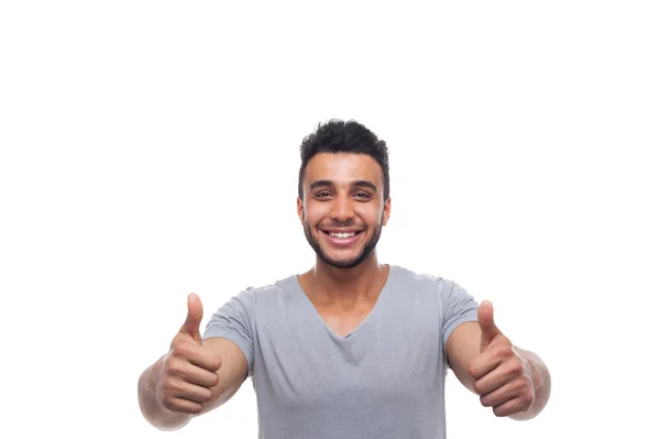 Casual hombre hold pulgar hasta feliz sonrisa joven guapo chico — Foto de Stock