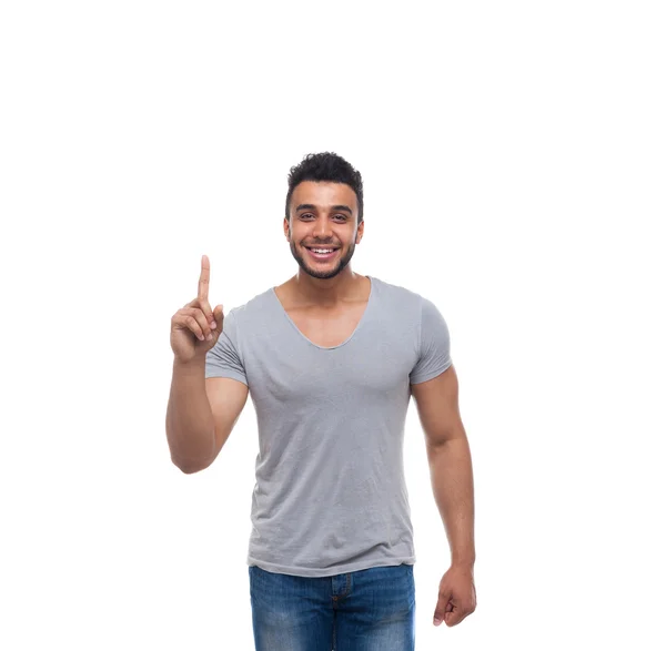 Casual guapo hombre punto dedo hasta copiar espacio feliz sonrisa — Foto de Stock