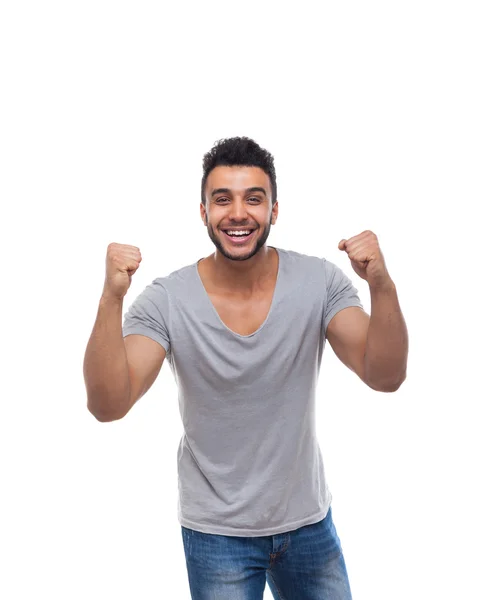 Hombre casual excitado agarre manos puño hasta feliz sonrisa — Foto de Stock