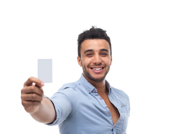 Hombre de negocios guapo mostrando en blanco tarjeta de visita vacía sonrisa feliz —  Fotos de Stock