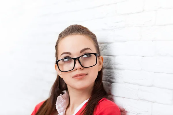 Businesswoman look up to copy space wear red jacket glasses think — Stock Photo, Image