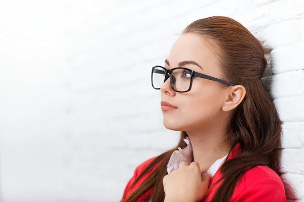 Businesswoman look up to copy space wear red jacket glasses seriuos think — Stock Photo, Image