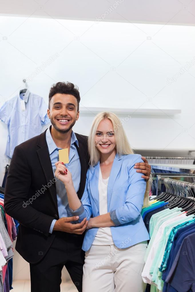 Young Couple Shopping, Happy Smiling Man And Woman Fashion Shop Hold Credit Card