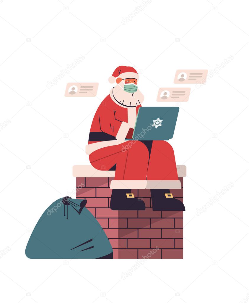 santa claus in protective mask sitting on chimney and using laptop happy new year merry christmas holidays celebration