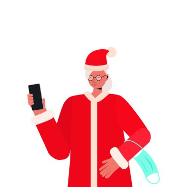 Yeni yıl için akıllı telefon kullanan olgun Noel Baba kadın Coronavirus karantinasını kutluyor.