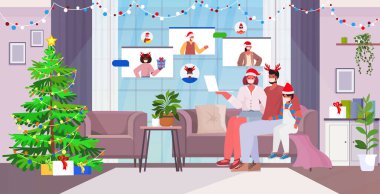 Maskeli aile, Coronavirus adlı video karantina sırasında karışık ırk arkadaşlarıyla tartışıyor. Kendini izole etme kavramı.