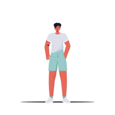 Gündelik kıyafet giyen genç adam erkek çizgi film karakteri tam boy poz veriyor.