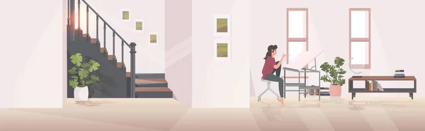 Девушка инженер сидит на рабочем месте с помощью ноутбука регулируемый стол рисования современный интерьер гостиной — стоковый вектор
