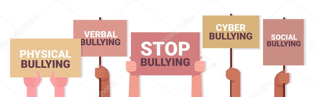 mix race activists hands holding stop bullying banners social anxiety psychotherapy concept