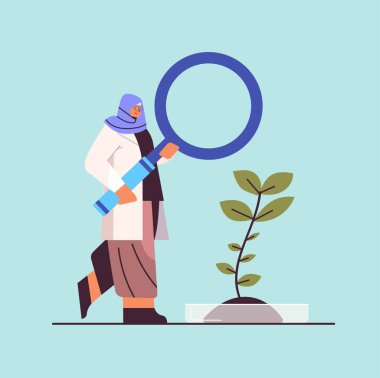 Arap bilim adamı büyüteç kadın araştırmacısıyla laboratuarda kimyasal deney yapıyor.