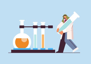 Test tüpü araştırmacısıyla çalışan Arap bilim adamı laboratuvar moleküler mühendisliğinde kimyasal deney yapıyor.